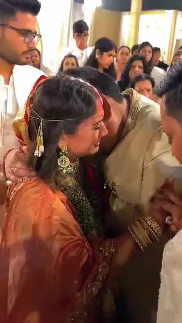 The Dramatic Company wedding film still: a bidai farewell embrace